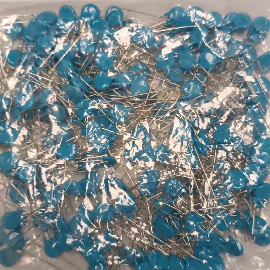 Picture of MURDEBF33A103ZA2B 10000PF 1000V 5mm  CAPACITOR