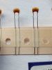 Picture of c324c101j1g5ta7301-100pf-50v-5mm-capacitor
